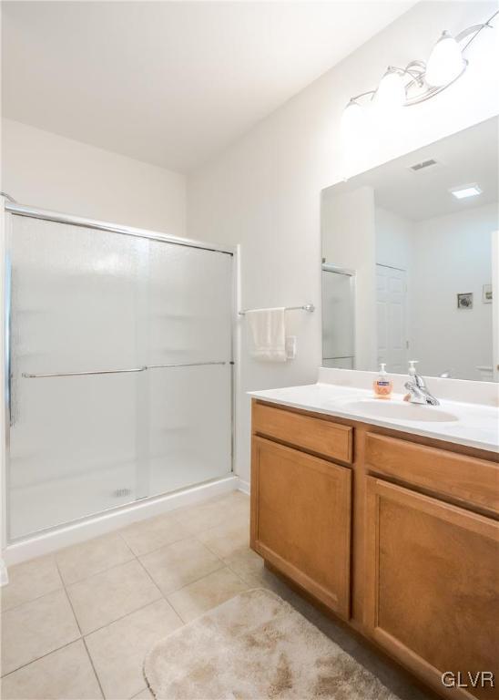 5536 Republic Way Bethlehem, PA 18017 - Photo 19 of 34 a bathroom with a shower sink and mirror