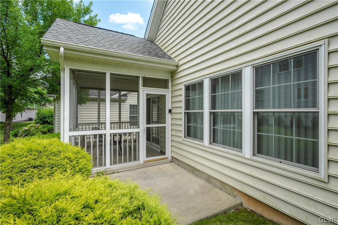 5536 Republic Way Bethlehem, PA 18017 - Photo 30 of 34 a view of a house with a large window and wooden fence