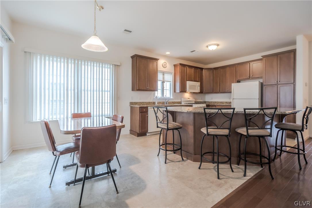 5536 Republic Way Bethlehem, PA 18017 - Photo 5 of 34 a view of a dining room with furniture and wooden floor