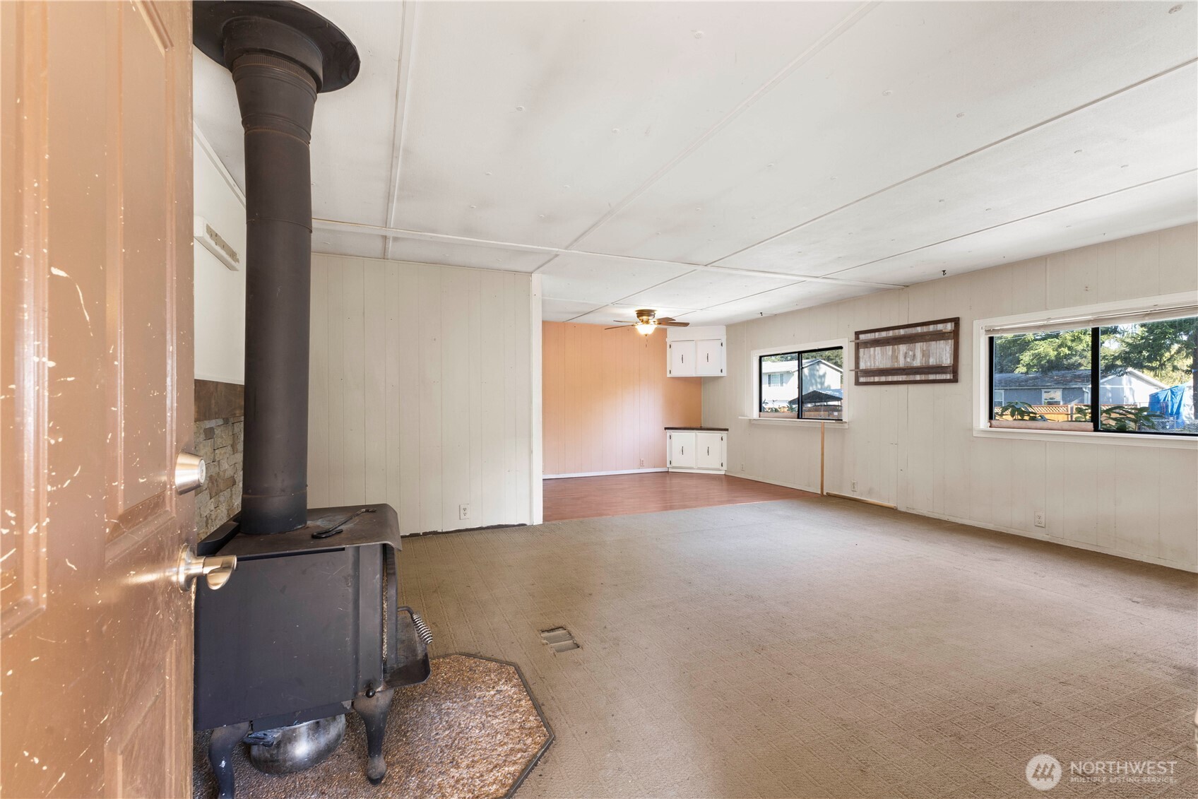 13125 Ridge Circle East Bonney Lake, WA 98391 - Photo 3 of 15 a view of a livingroom with furniture and floor to ceiling window