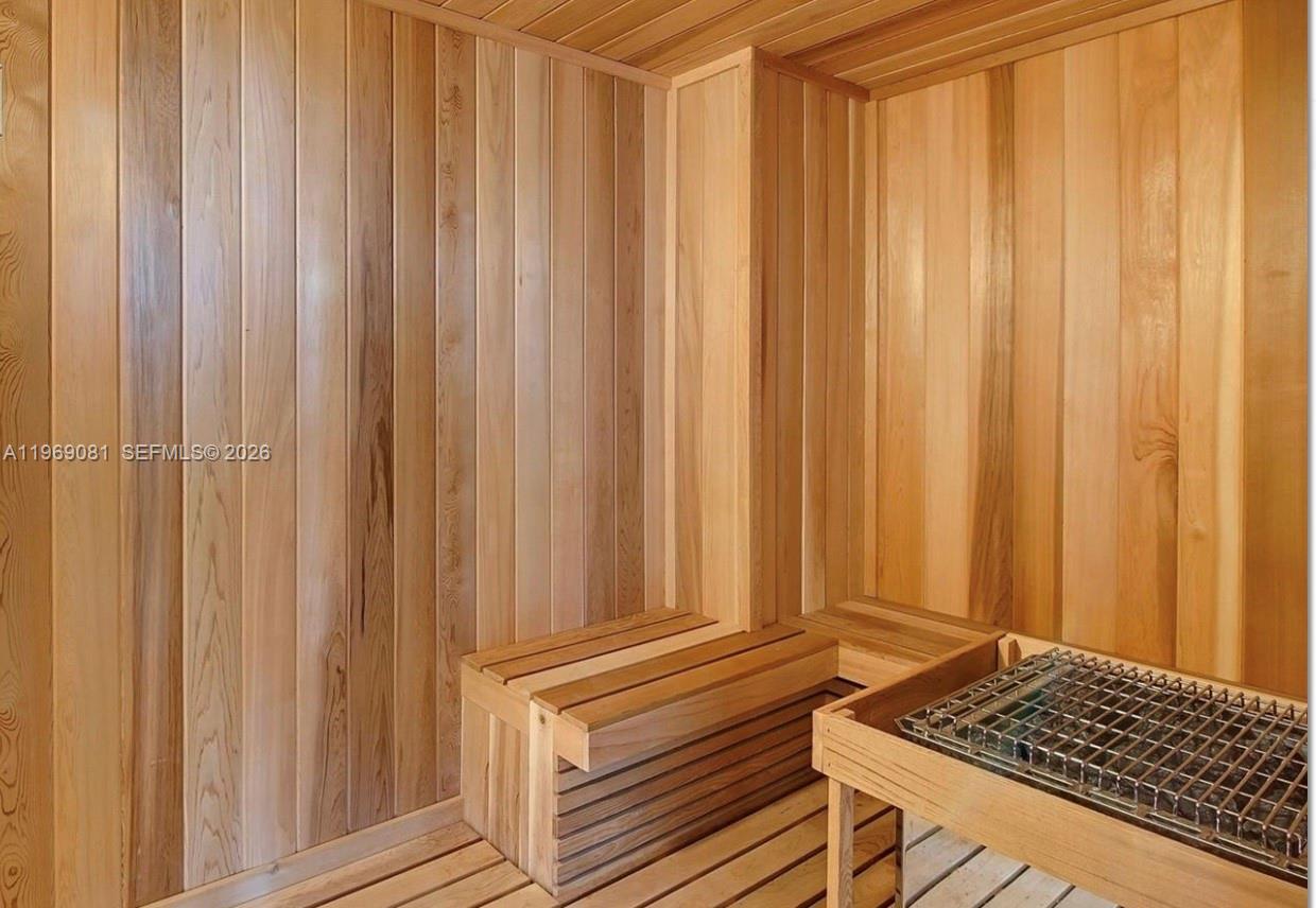 460 Northeast 28th Street, Unit 2102 Miami, FL 33137 - Photo 6 of 14 a bathroom with a shower curtain and curtain