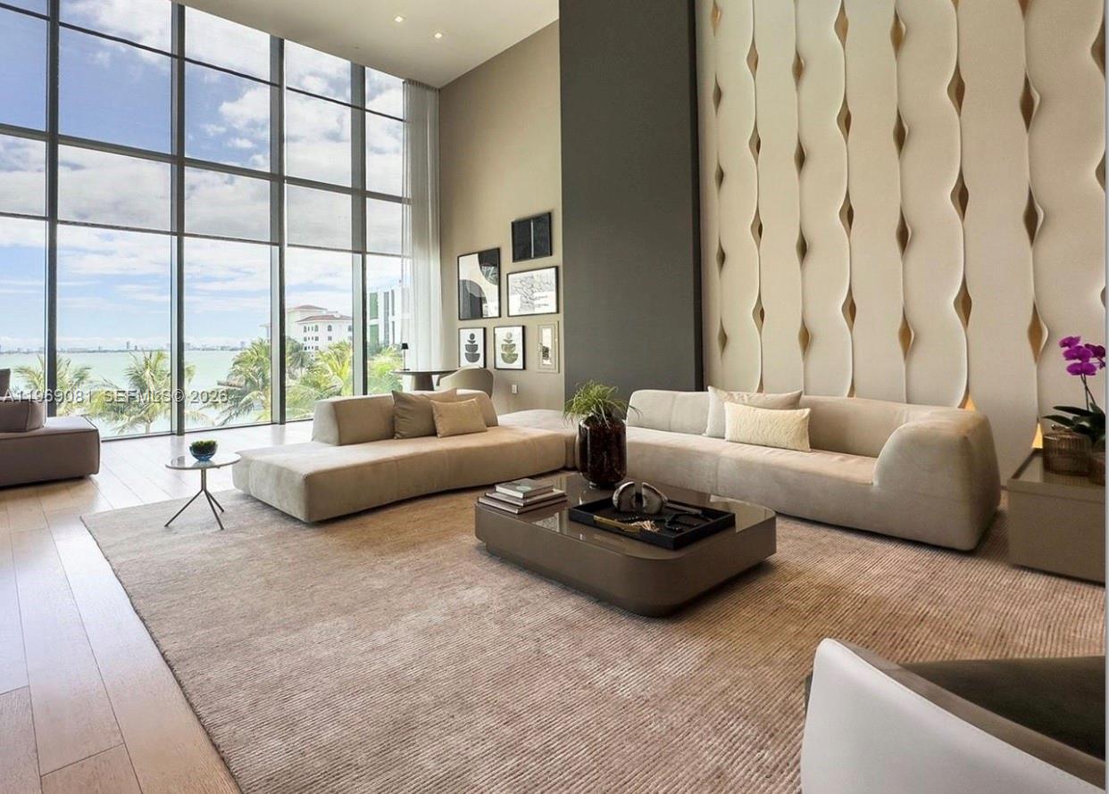 460 Northeast 28th Street, Unit 2102 Miami, FL 33137 - Photo 10 of 14 a living room with furniture and a large window