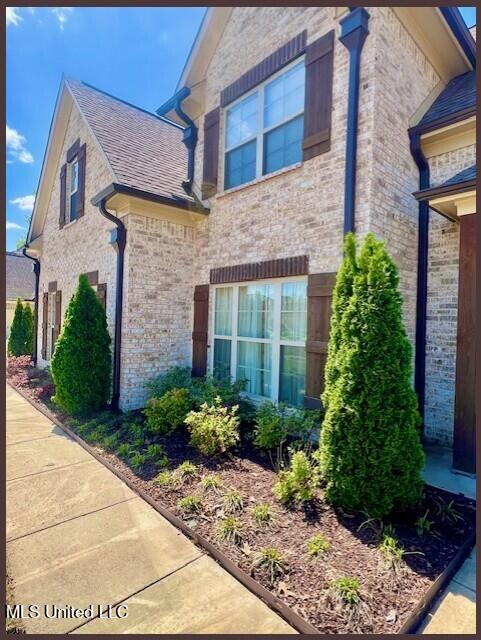 3445 Scott Road Hernando, MS 38632 - Photo 3 of 54 3445 SCOTT - FRONT - CLOSE OF FLOWER BED