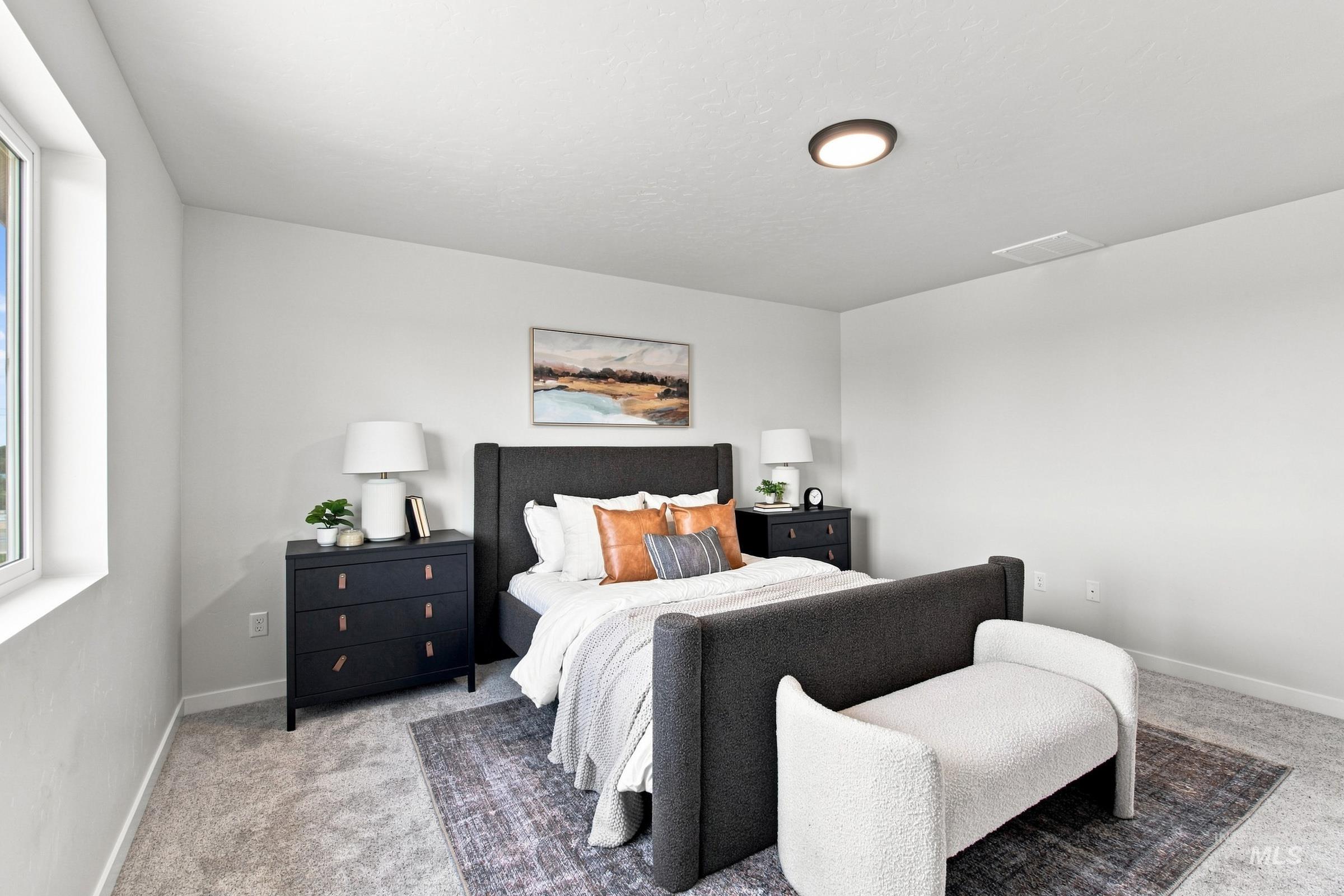 14044 Shiny Spruce Street Caldwell, ID 83607 - Photo 32 of 37 Recessed lighting, large window, neutral wall paint, and gray carpet