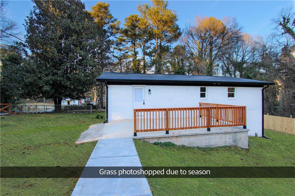 102 Welch Street Stockbridge, GA 30281 - Photo 2 of 28 front view of a house with a yard