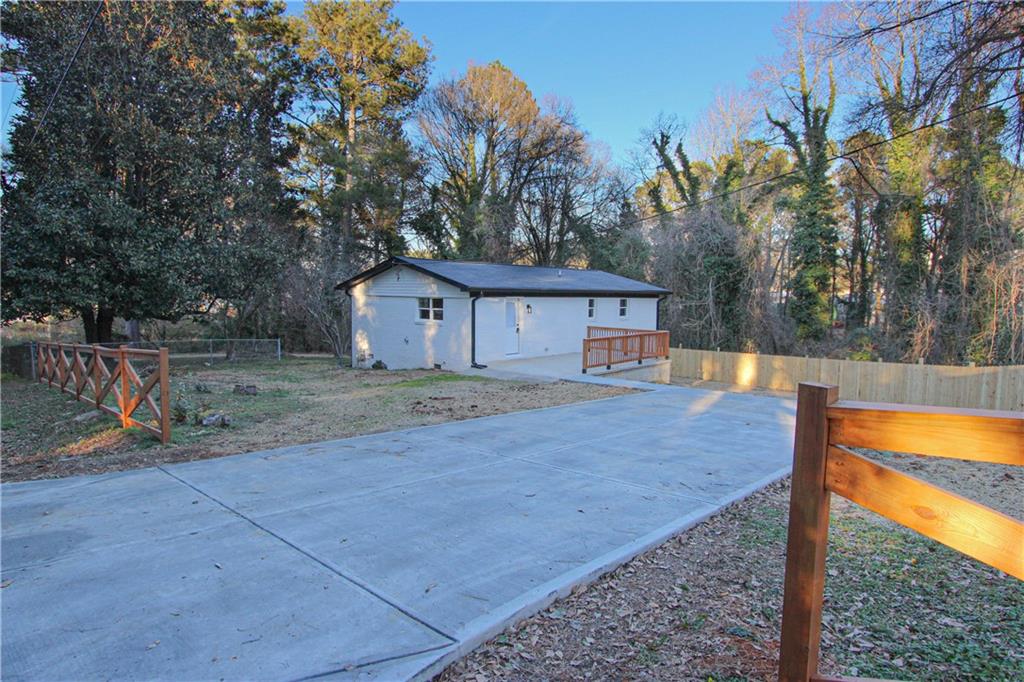 102 Welch Street Stockbridge, GA 30281 - Photo 26 of 28 a house view with a backyard space