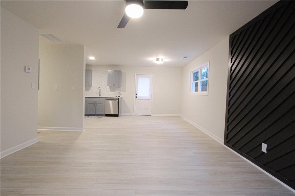 102 Welch Street Stockbridge, GA 30281 - Photo 6 of 28 a view of an empty room with a window