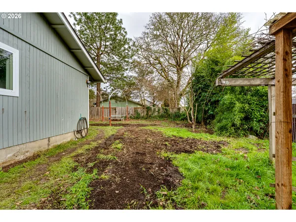 a backyard of a house with lots of green space
