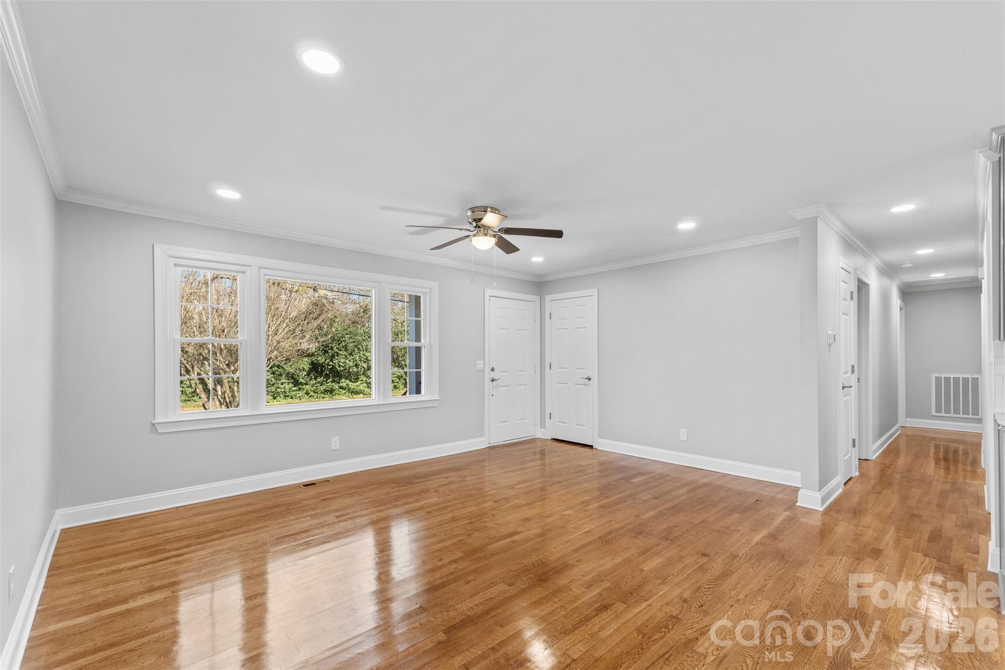 206 Hunter Street York, SC 29745 - Photo 3 of 20 a view of an empty room with a window