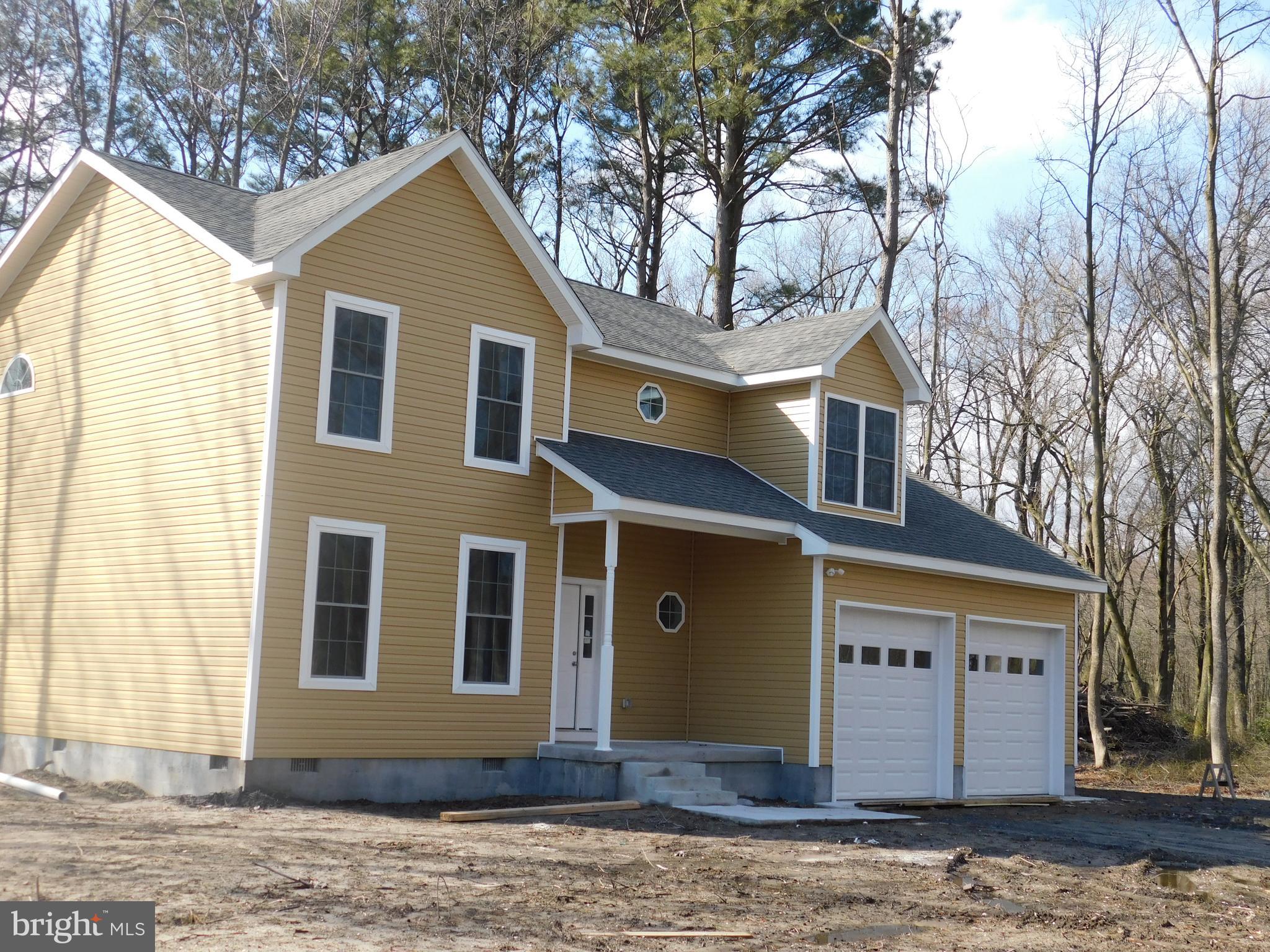 2 Whaleys Road Delmar, DE 19940 - Photo 1 of 28 a front view of a house