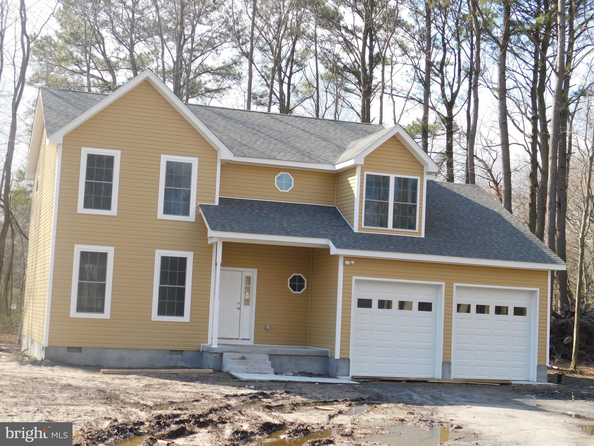 2 Whaleys Road Delmar, DE 19940 - Photo 2 of 28 a front view of a house with a yard