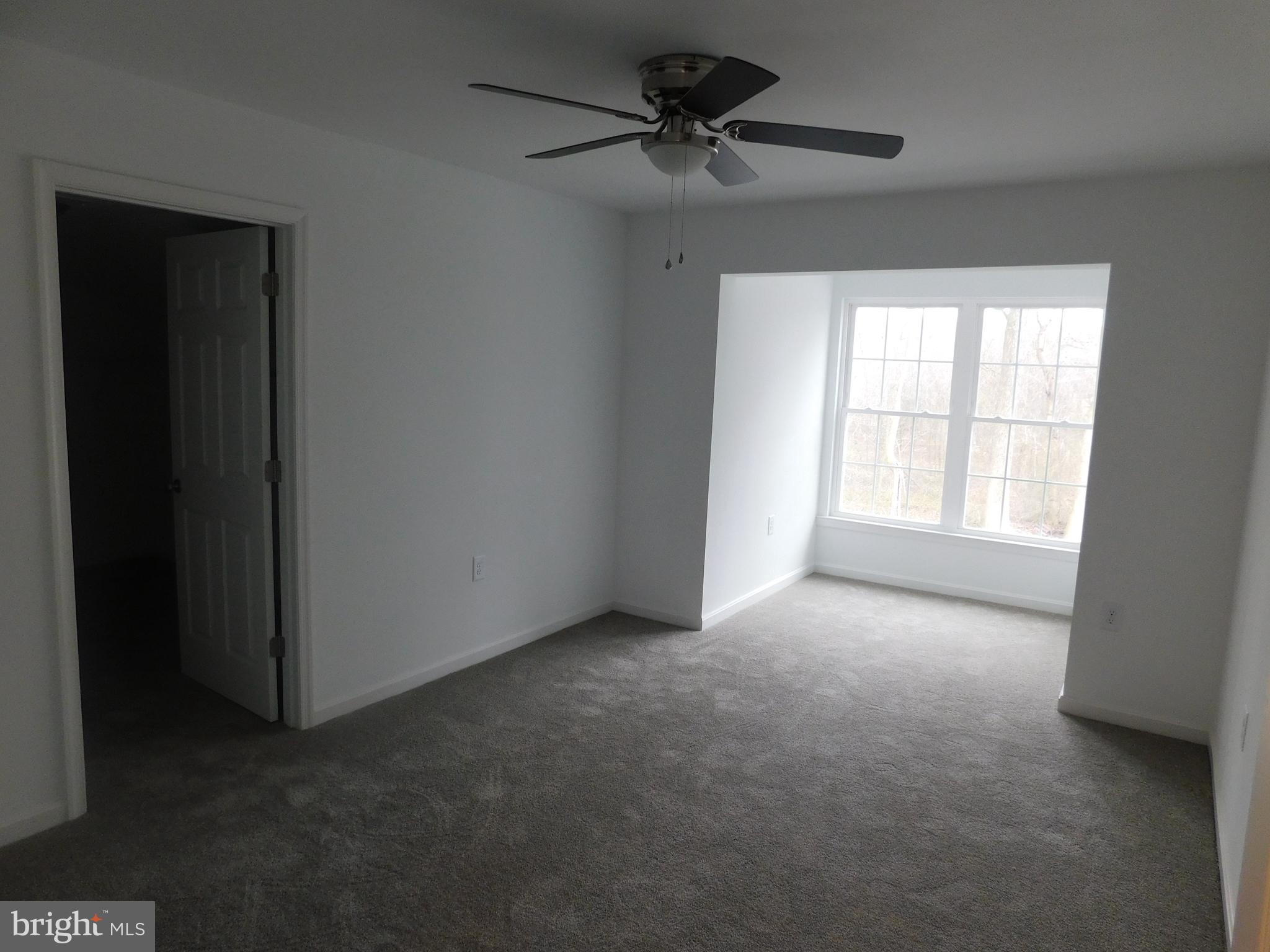 2 Whaleys Road Delmar, DE 19940 - Photo 22 of 28 a view of empty room with windows