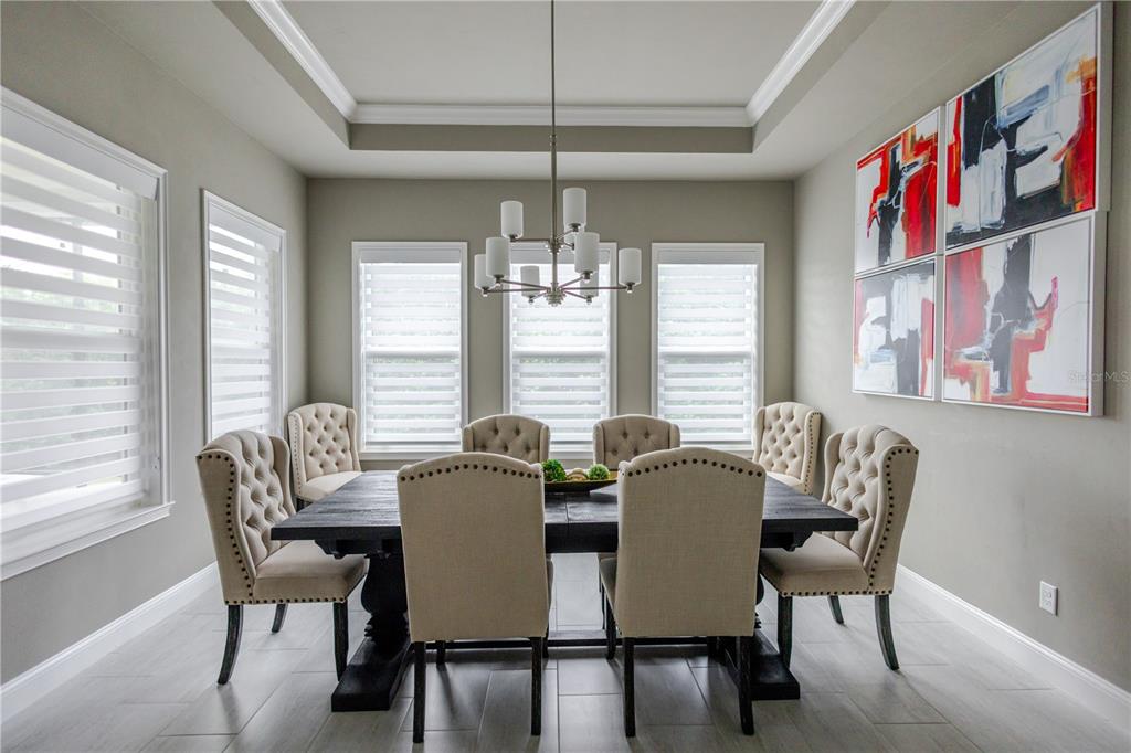 11967 Southwest 32nd Lane Gainesville, FL 32608 - Photo 15 of 22 a view of a dining room with furniture window and outside view