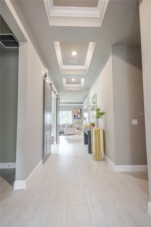 11967 Southwest 32nd Lane Gainesville, FL 32608 - Photo 20 of 22 a view of a hallway with seating area