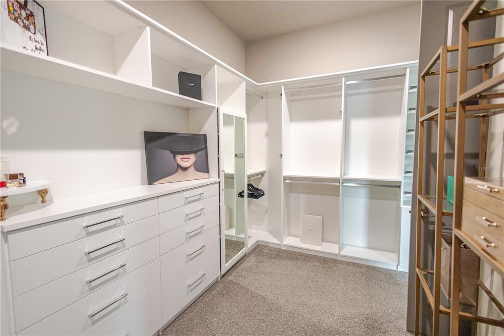 11967 Southwest 32nd Lane Gainesville, FL 32608 - Photo 5 of 22 a bathroom with a shower sink and mirror