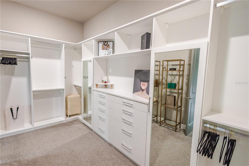 11967 Southwest 32nd Lane Gainesville, FL 32608 - Photo 6 of 22 a view of walk in closet