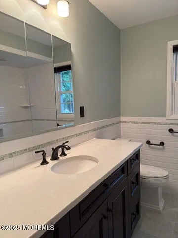 a bathroom with a sink and a toilet