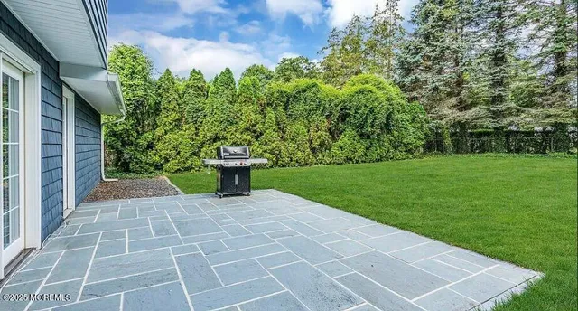 a view of a backyard with a garden