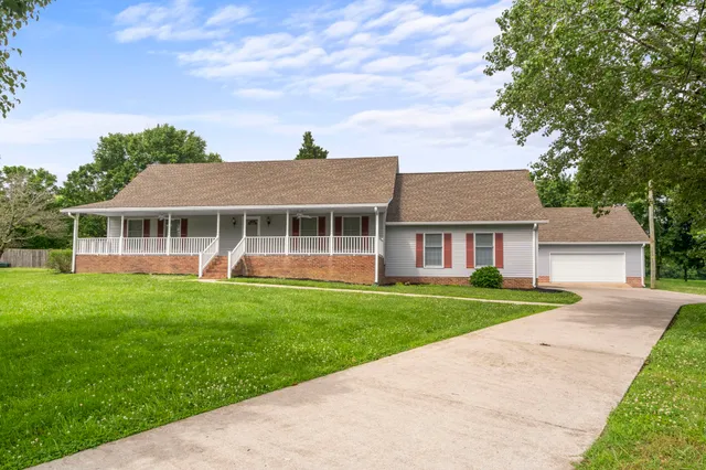 front view of a house and a yard
