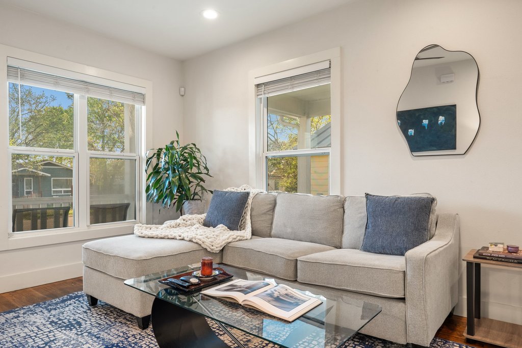 2702 Crest Avenue, Unit 1 Austin, TX 78702 - Photo 7 of 29 The spacious living area offers an inviting atmosphere for everyday living and entertaining.