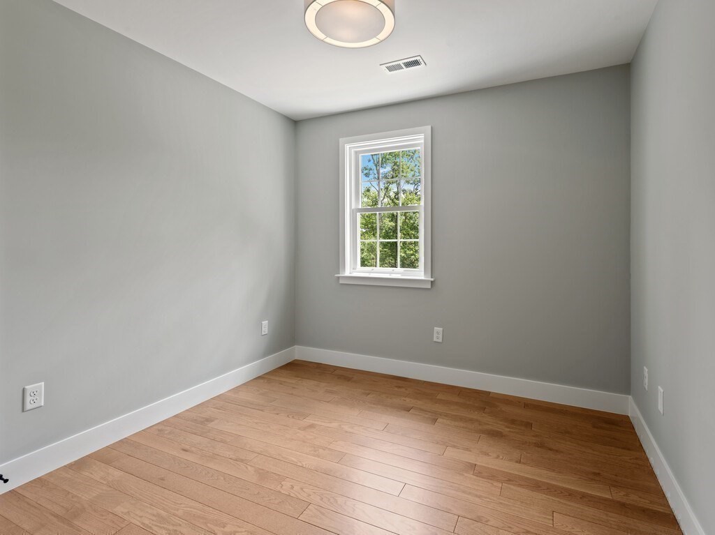 126 Old Southbridge Road Dudley, MA 01571 - Photo 29 of 40 wooden floor in an empty room with a window