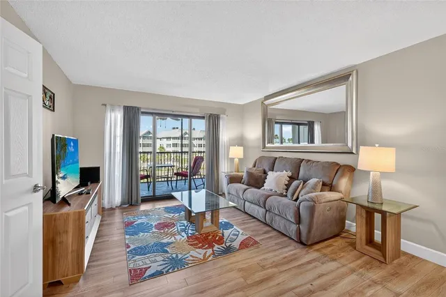 $599,000 | 5855 Midnight Pass Road, Unit 408, Sarasota, FL 34242