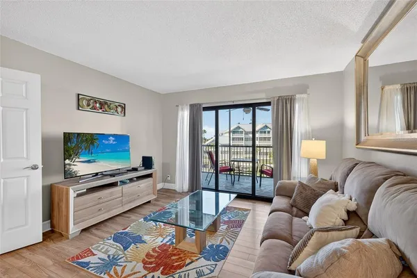 $599,000 | 5855 Midnight Pass Road, Unit 408, Sarasota, FL 34242