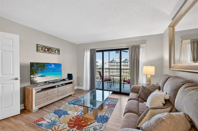 $599,000 | 5855 Midnight Pass Road, Unit 408, Sarasota, FL 34242