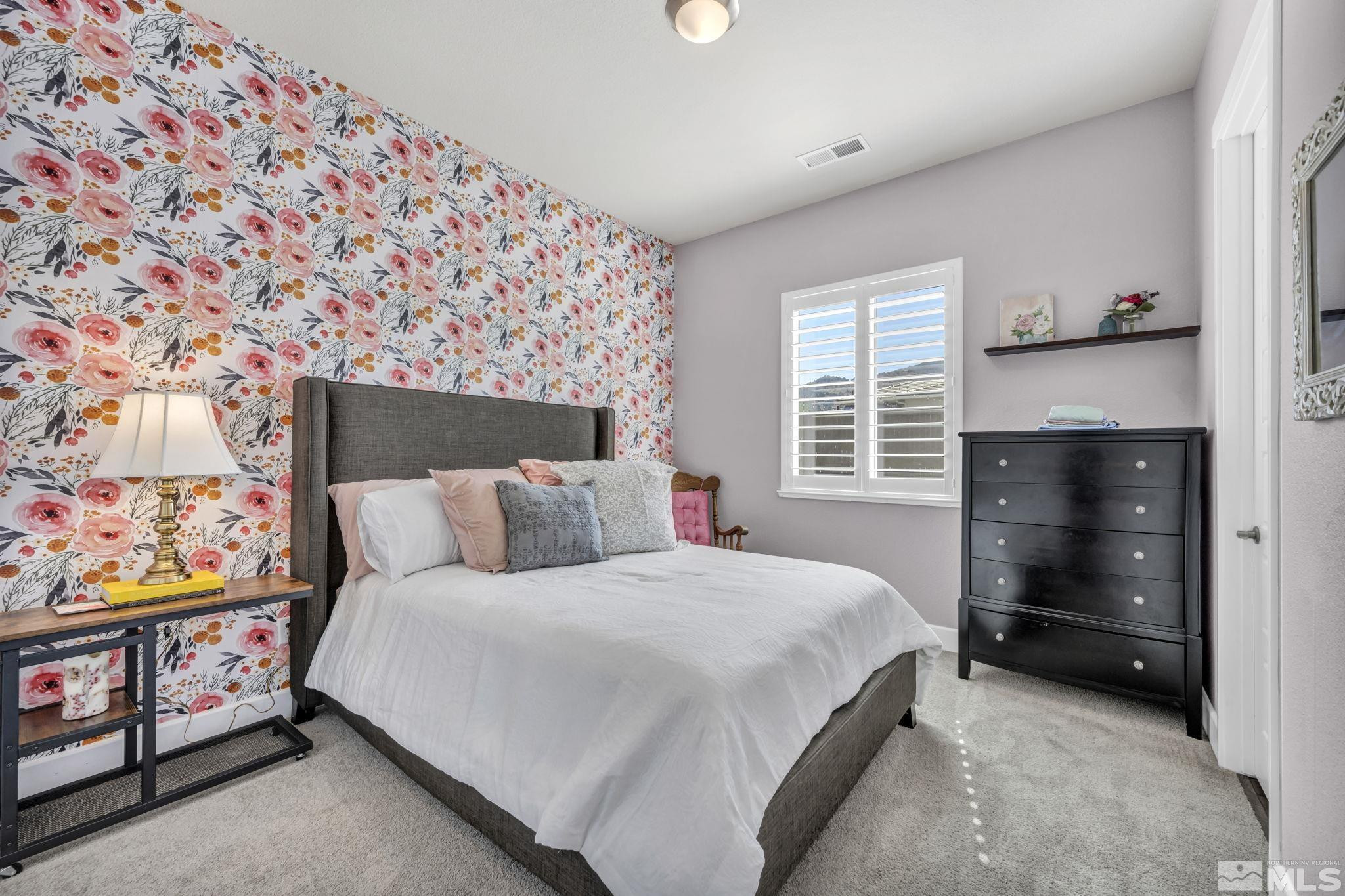 1237 Crawford Crk Drive Reno, NV 89521 - Photo 16 of 39 a bedroom with a bed and a dresser