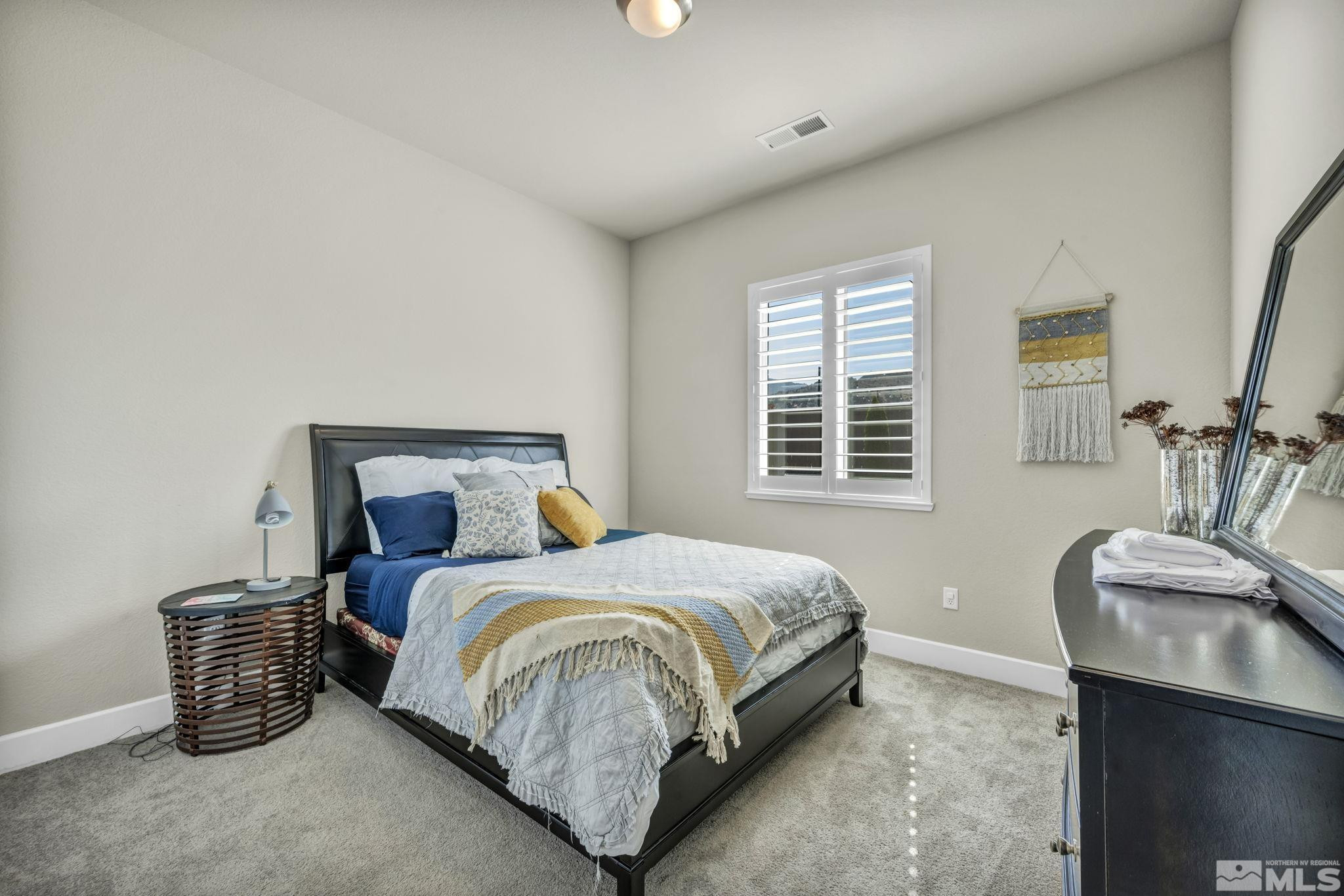 1237 Crawford Crk Drive Reno, NV 89521 - Photo 20 of 39 a bedroom with a bed and a window