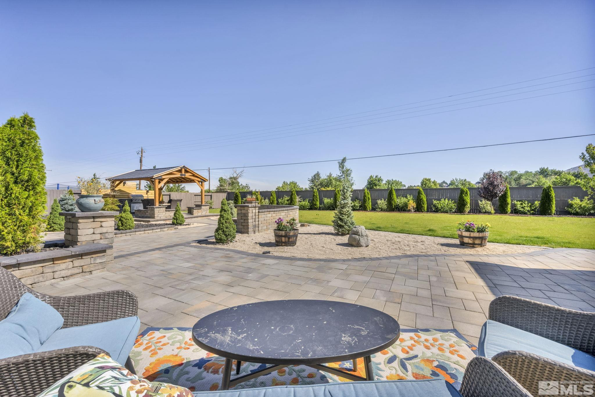 1237 Crawford Crk Drive Reno, NV 89521 - Photo 33 of 39 a view of a swimming pool and a yard