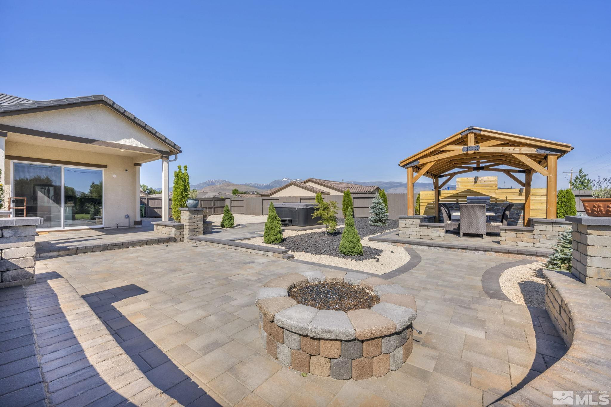 1237 Crawford Crk Drive Reno, NV 89521 - Photo 34 of 39 a swimming pool with outdoor seating