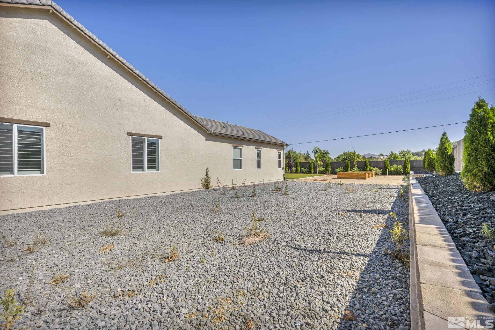 1237 Crawford Crk Drive Reno, NV 89521 - Photo 37 of 39 a view of a house with a backyard