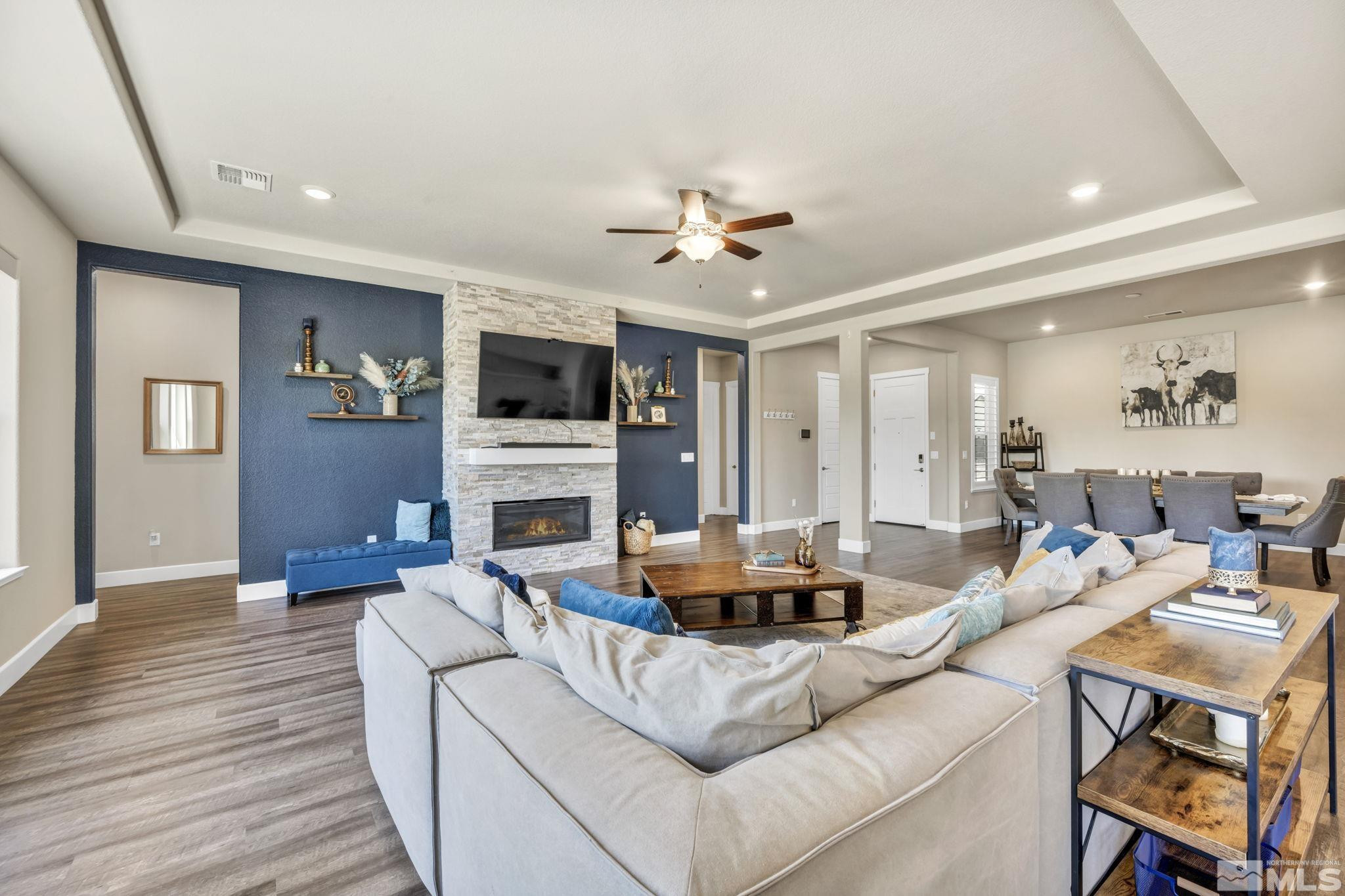 1237 Crawford Crk Drive Reno, NV 89521 - Photo 8 of 39 a living room with fireplace furniture and a wooden floor