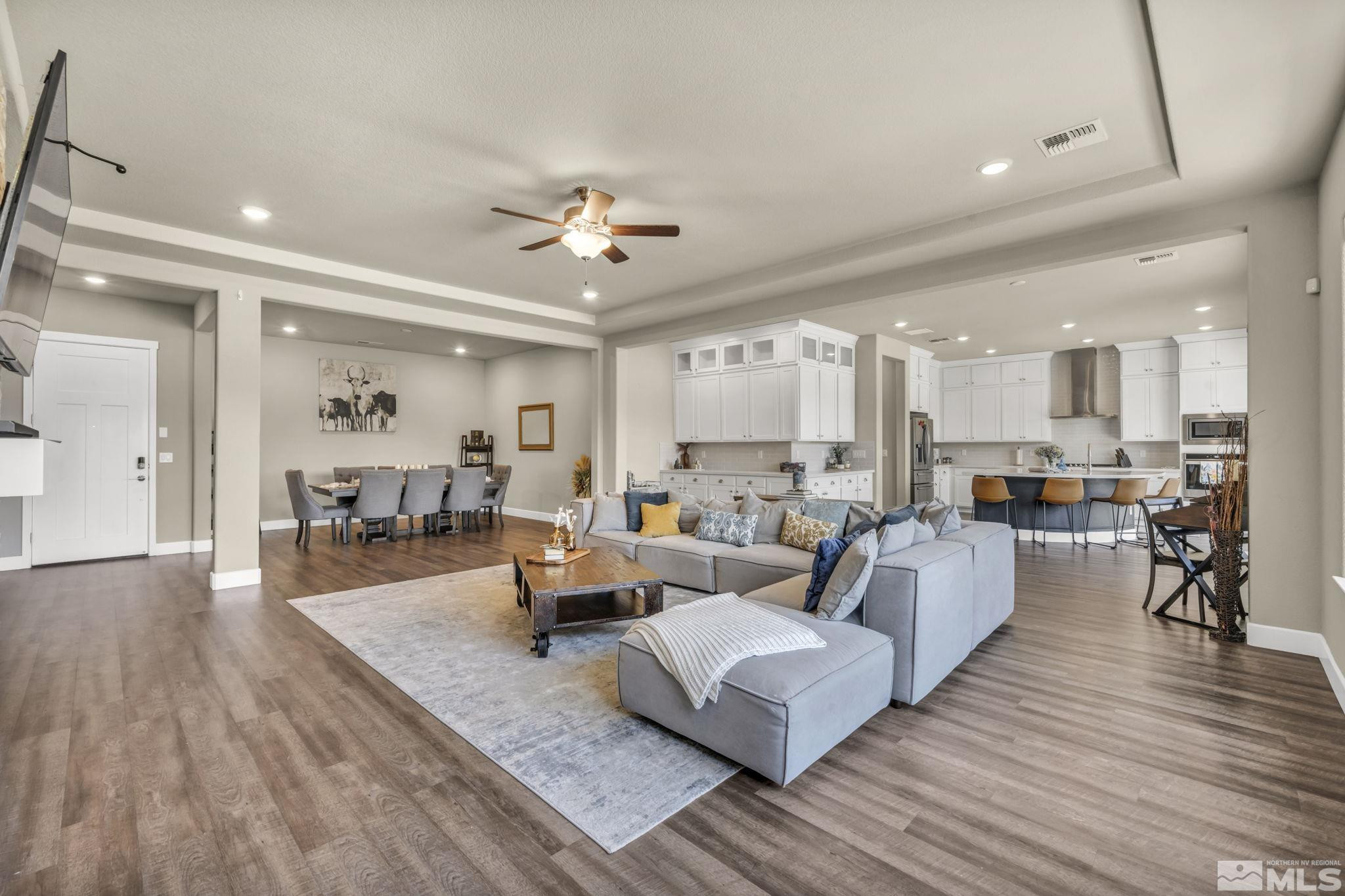 1237 Crawford Crk Drive Reno, NV 89521 - Photo 9 of 39 a living room with furniture and a wooden floor