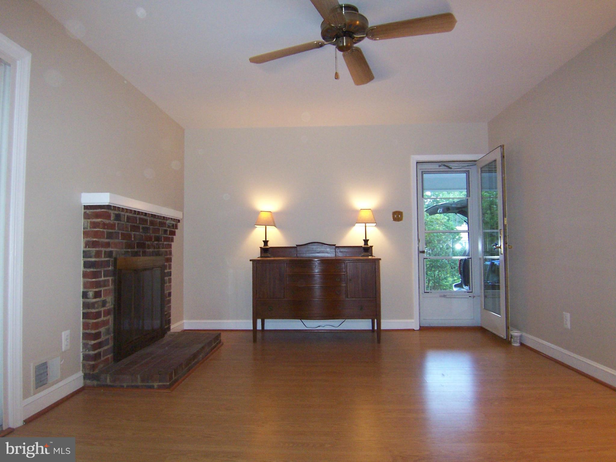 6136 Roxbury Avenue Springfield, VA 22152 - Photo 6 of 22 Family Room w/Brick Hearth Fireplace