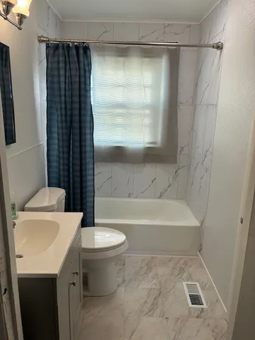 a bathroom with a sink and a toilet