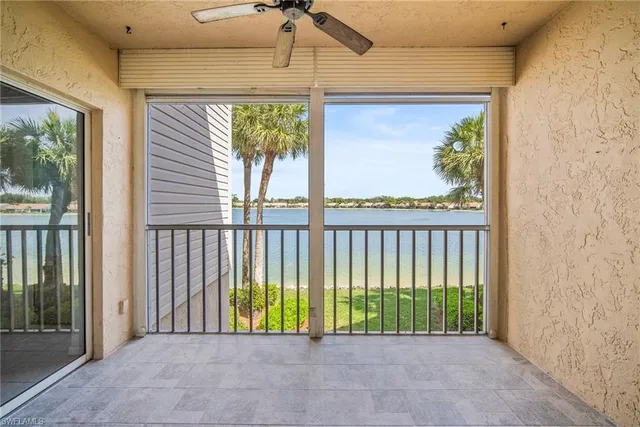 a view of a room with a large window