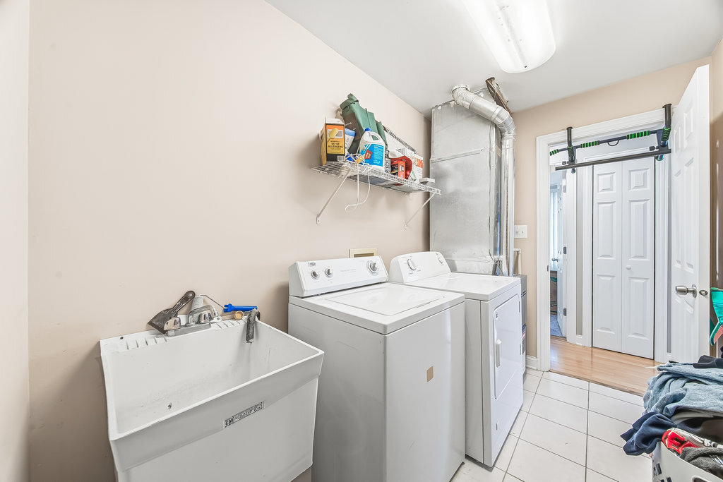 9512 Birch Avenue Mokena, IL 60448 - Photo 16 of 17 a utility room with dryer and washer