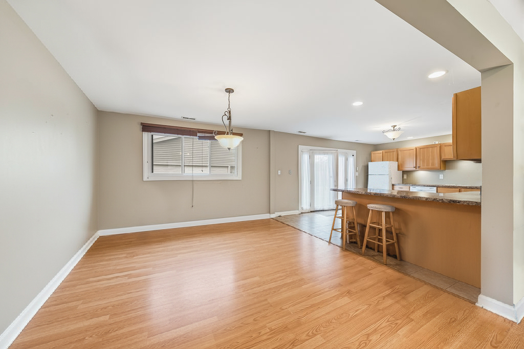 9512 Birch Avenue Mokena, IL 60448 - Photo 8 of 17 a view of kitchen with sink and wooden floor