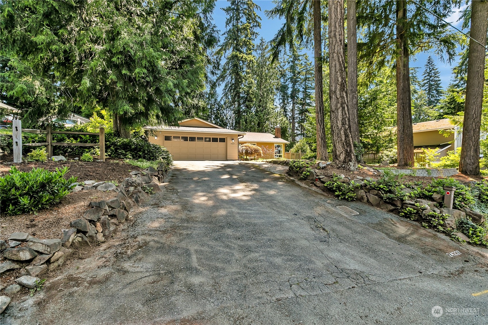 24227 4th Place West Bothell, WA 98021 - Photo 3 of 31 a view of a house with a yard and tree s