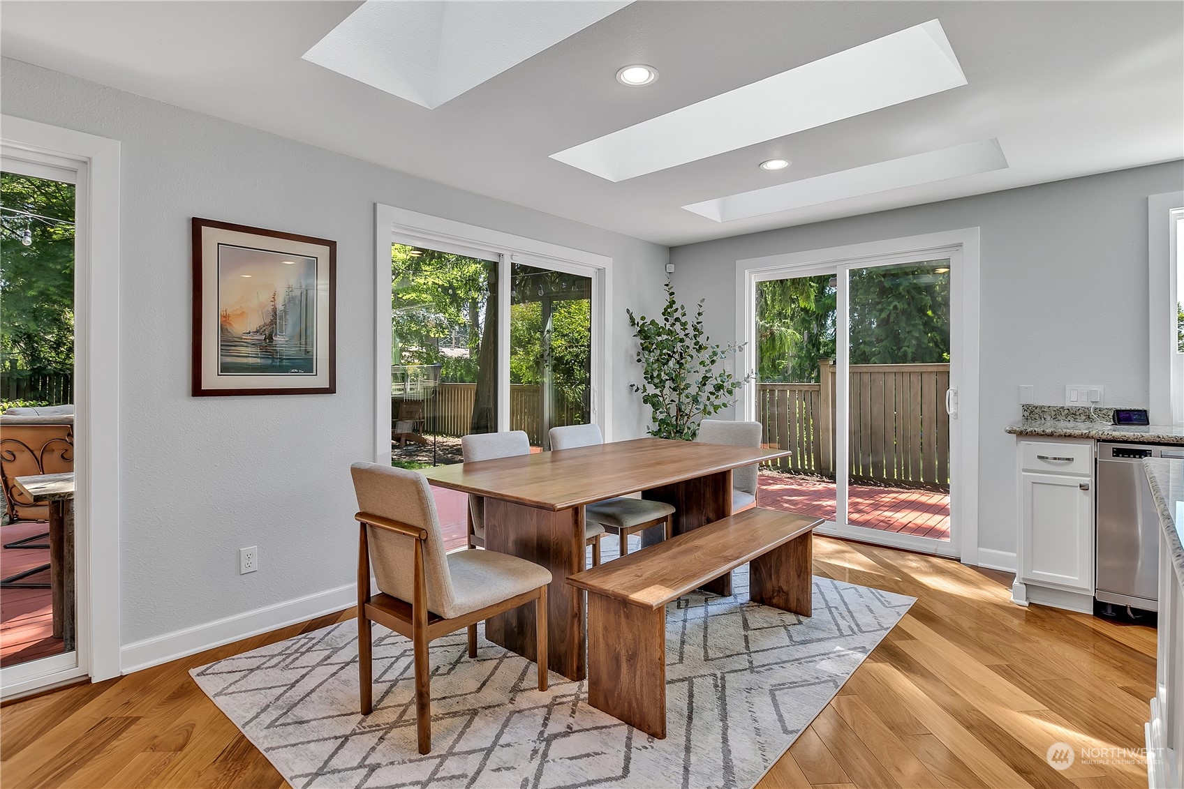24227 4th Place West Bothell, WA 98021 - Photo 9 of 31 a dining room with a table and chairs
