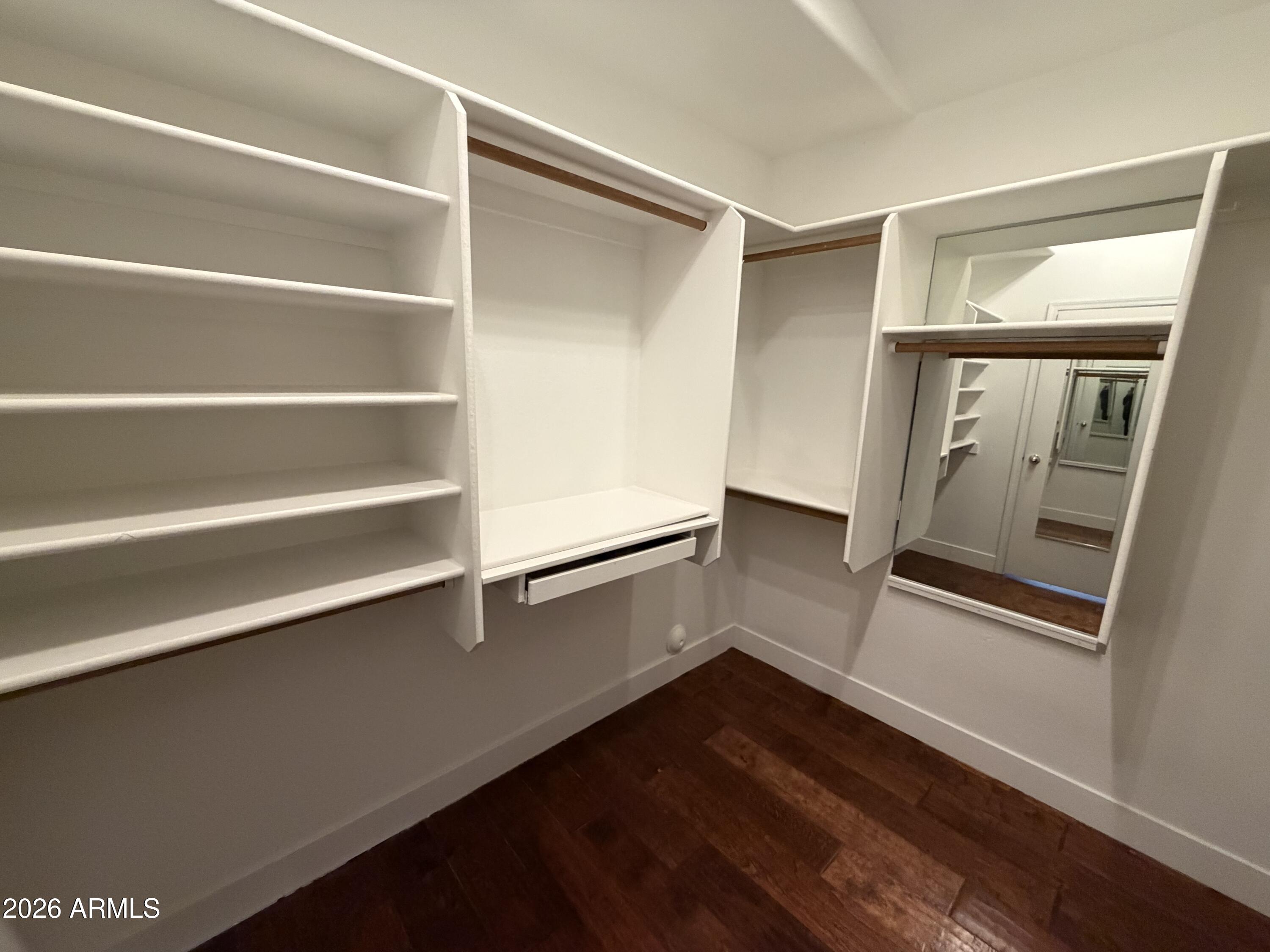 473 West Smoke Tree Road Gilbert, AZ 85233 - Photo 24 of 41 a hallway with wooden floor