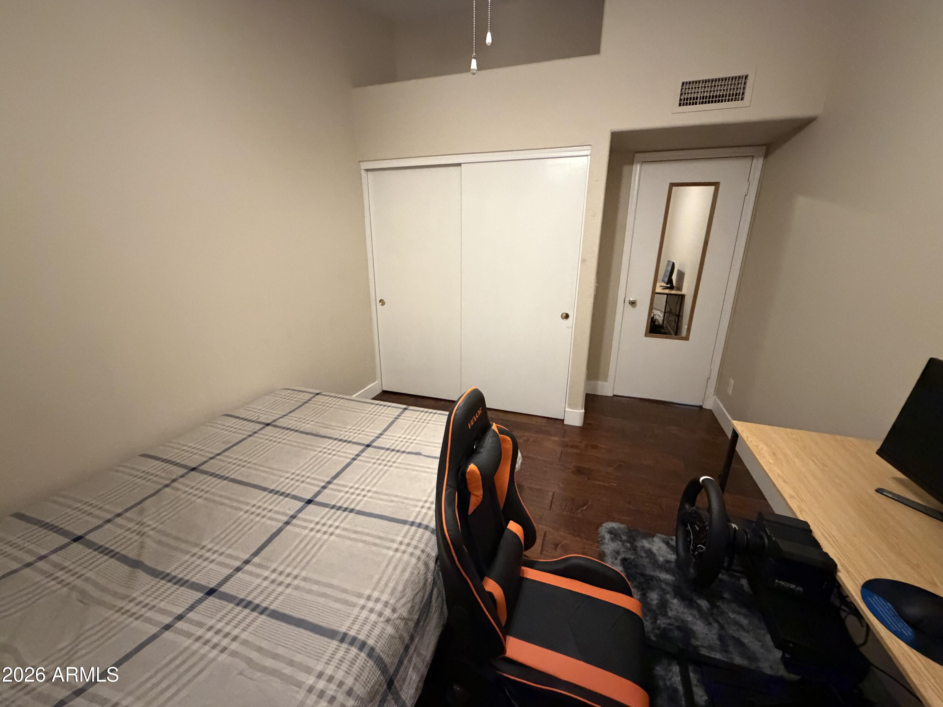 473 West Smoke Tree Road Gilbert, AZ 85233 - Photo 29 of 41 a bedroom with a bed and a dresser