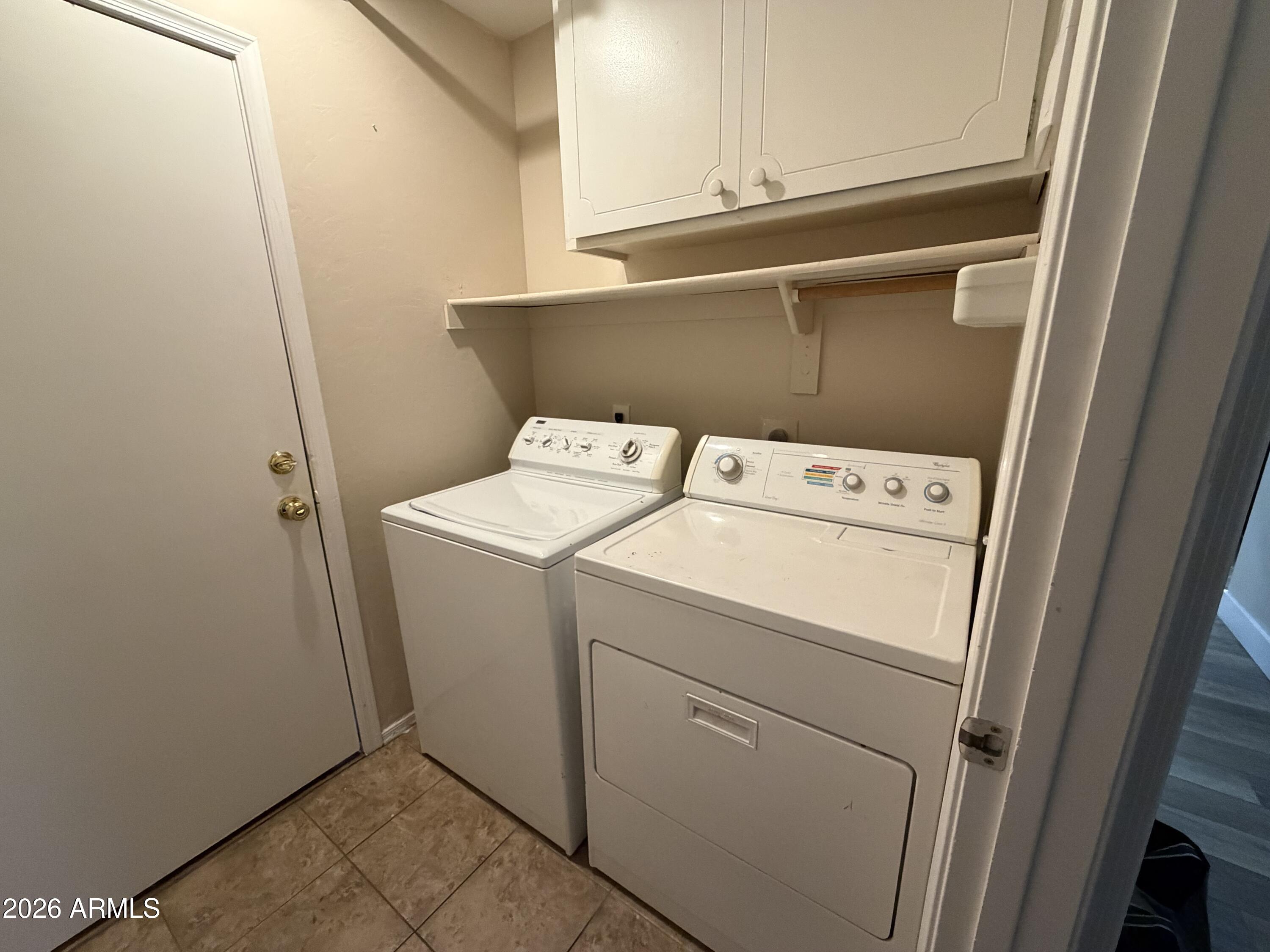 473 West Smoke Tree Road Gilbert, AZ 85233 - Photo 31 of 41 a utility room with dryer and washer