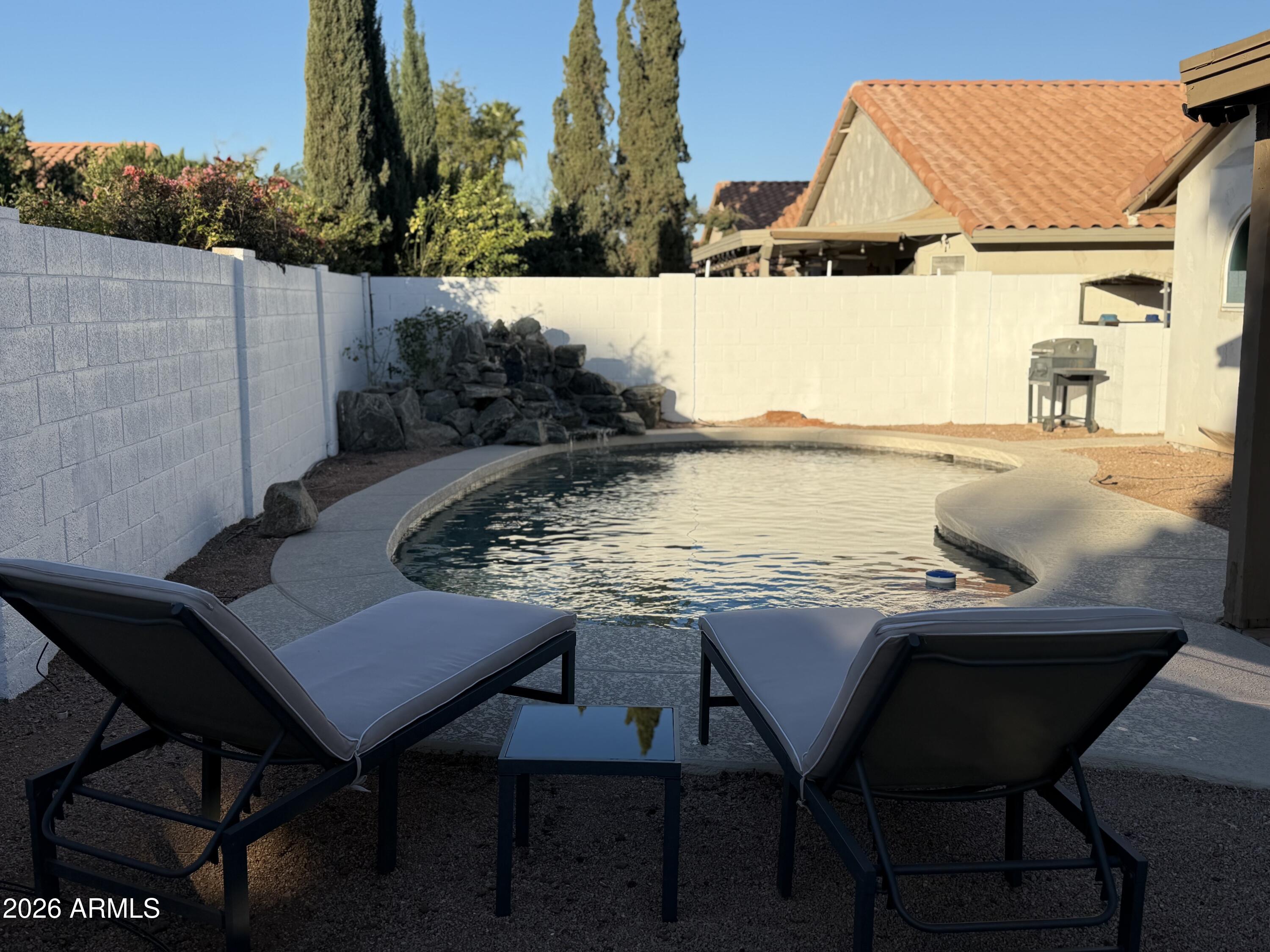 473 West Smoke Tree Road Gilbert, AZ 85233 - Photo 35 of 41 a view of a outdoor seating area with furniture