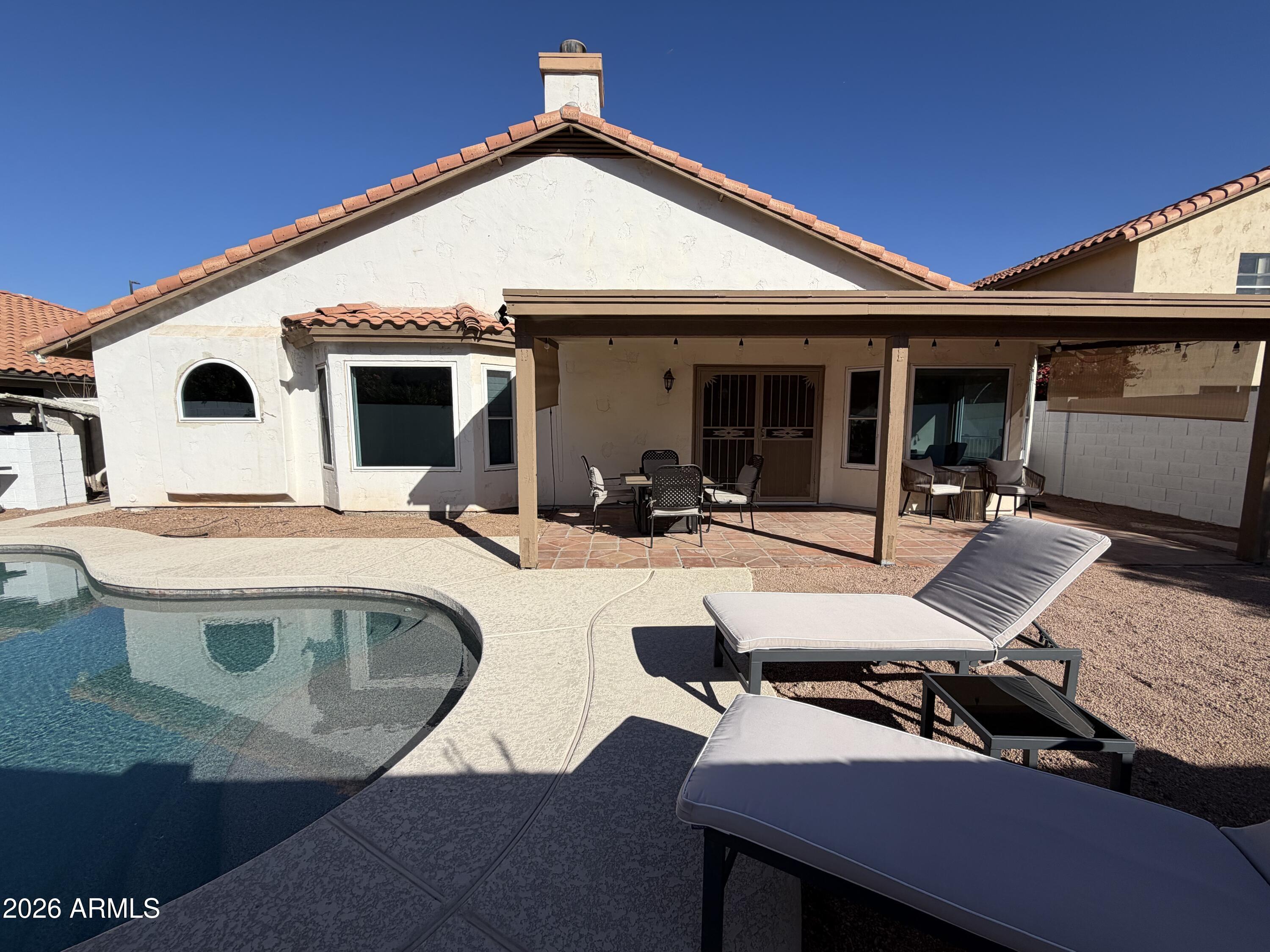 473 West Smoke Tree Road Gilbert, AZ 85233 - Photo 40 of 41 a view of outdoor kitchen with seating space