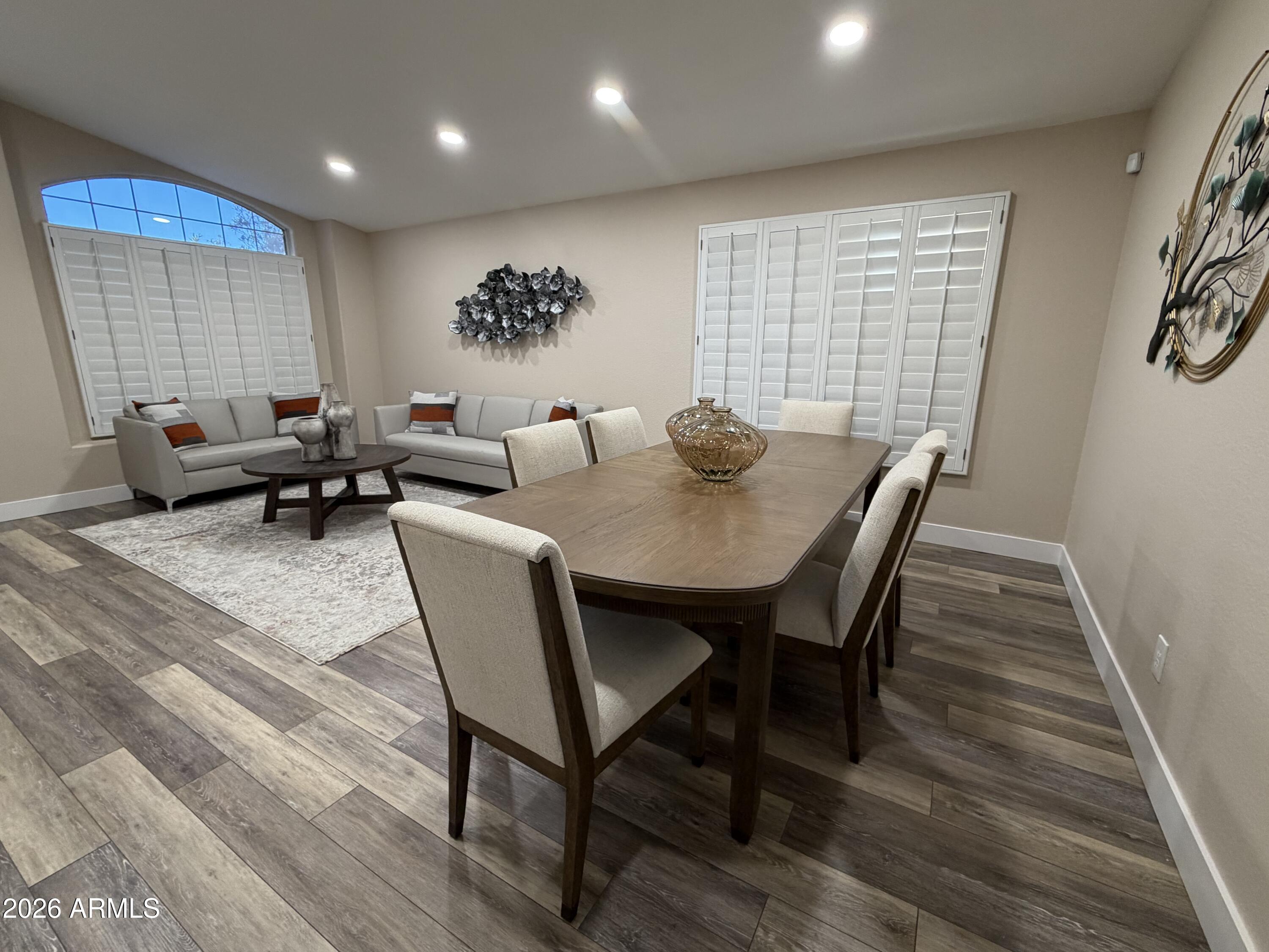 473 West Smoke Tree Road Gilbert, AZ 85233 - Photo 9 of 41 a view of a dining room with furniture