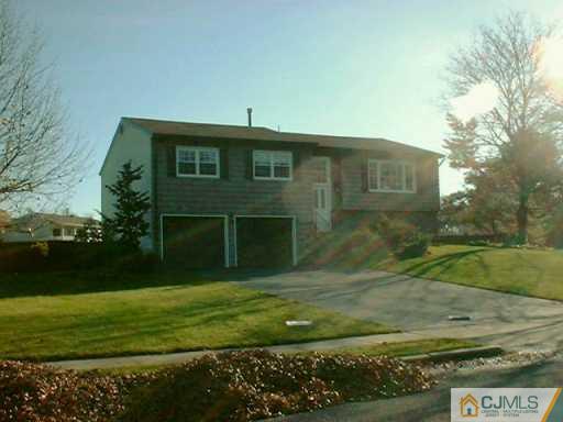 41 Norton Road Monmouth Junction, NJ 08852 - Photo 3 of 4 a front view of a house with a yard
