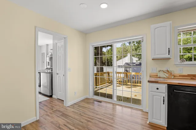 a view of a kitchen with a window